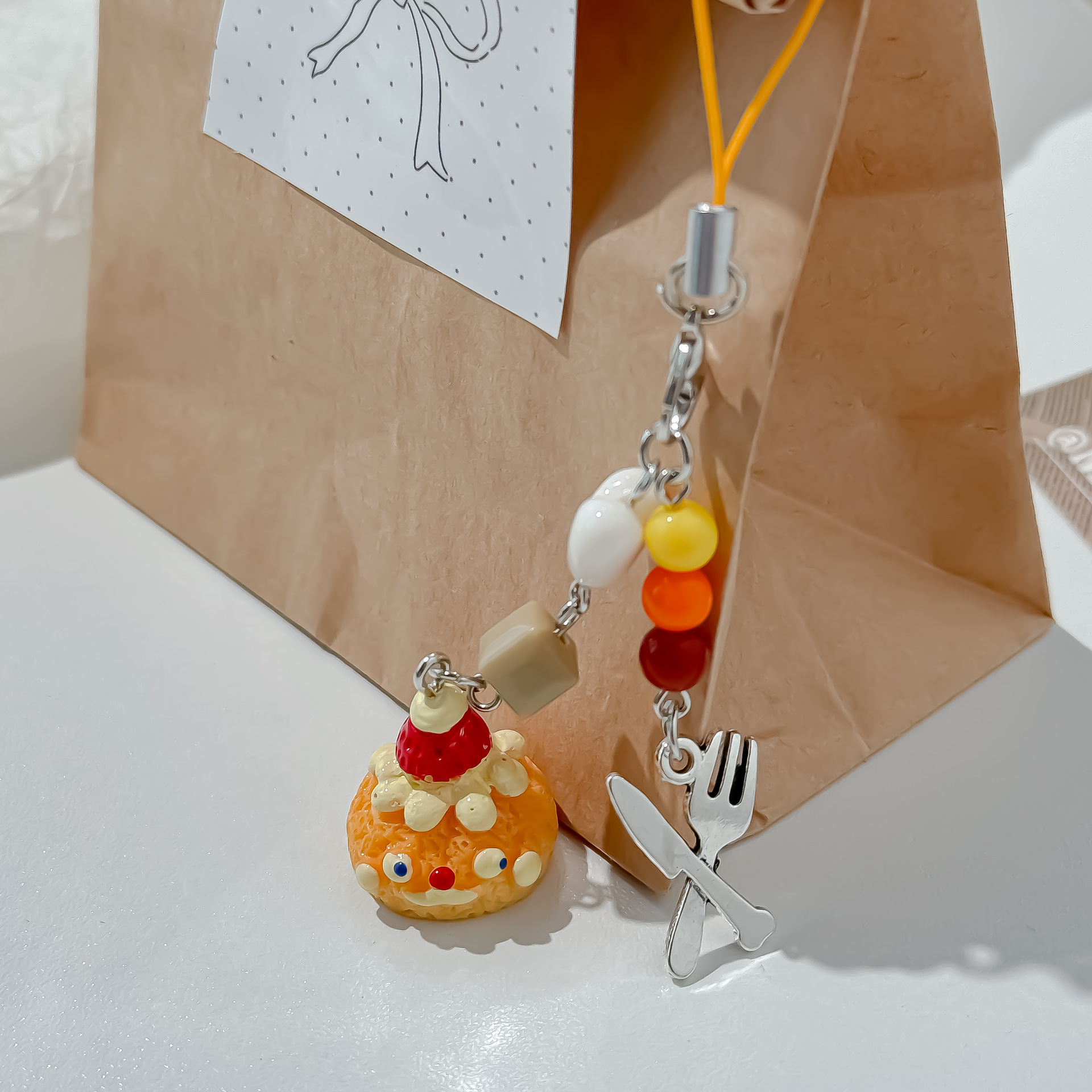 New Cute Cream Puff Bag Pendan - مراجعة Food Zinc وسعره
