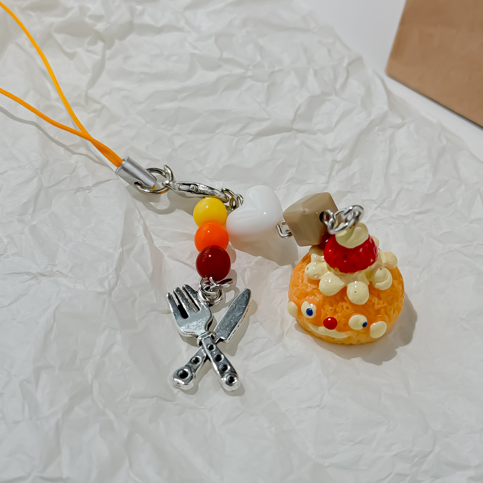 New Cute Cream Puff Bag Pendan - مراجعة Food Zinc وسعره